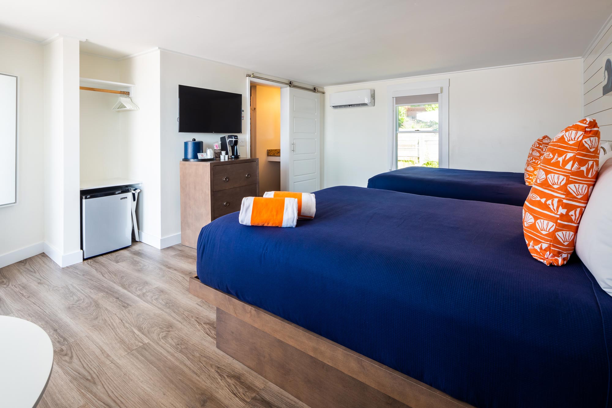 Bright hotel room with two beds